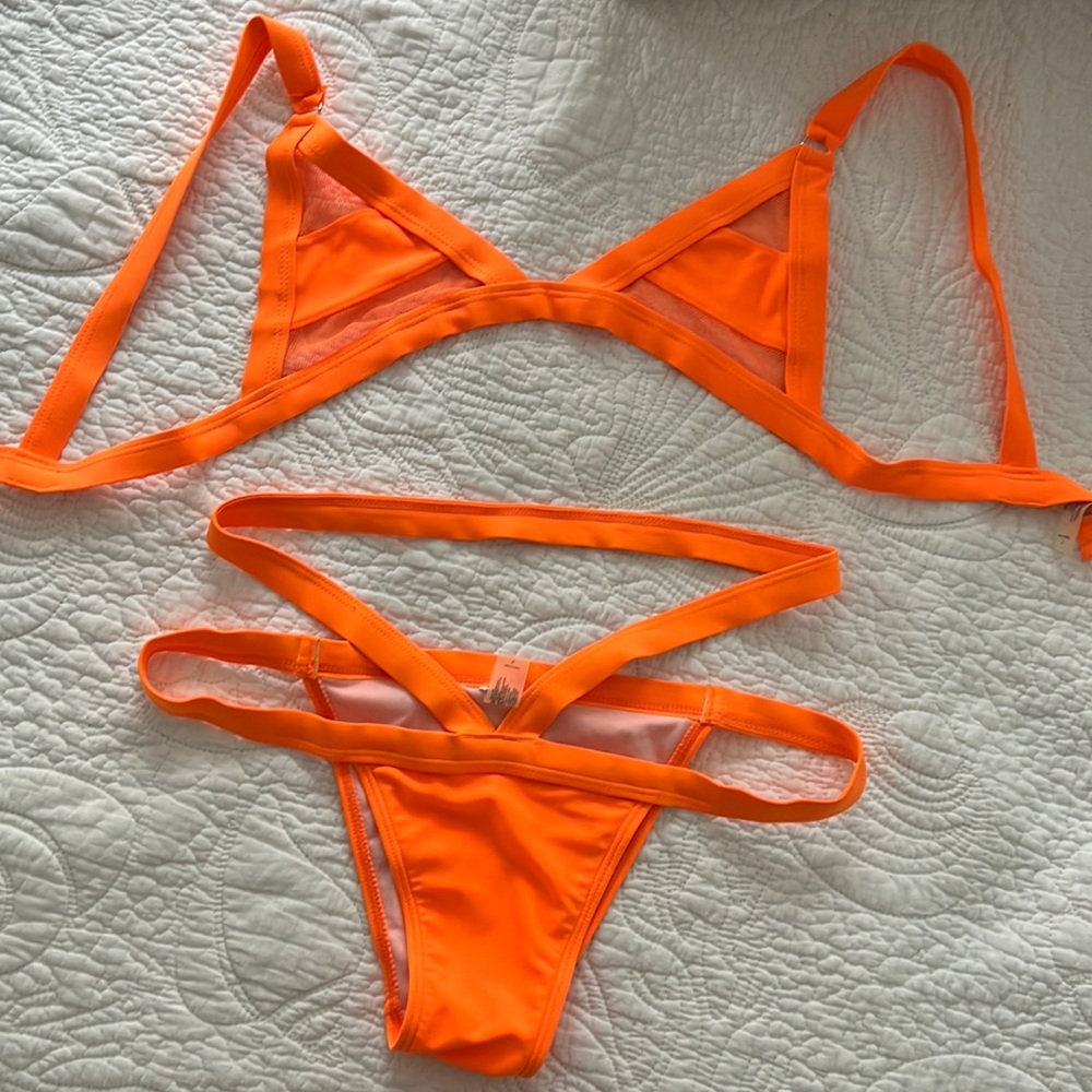 Large, bright orange bikini